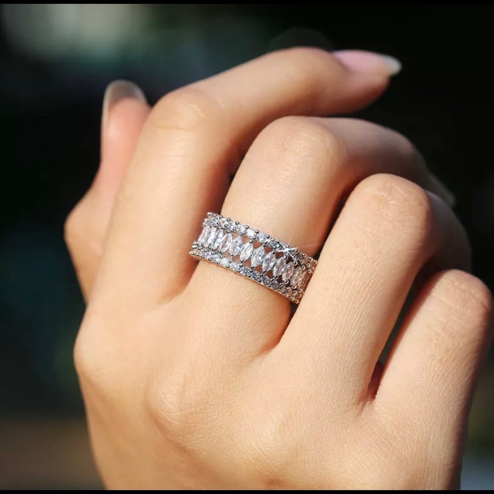 Oval cut infinity eternity ring band